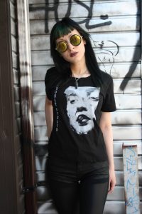 Lovina models a Double Eyelid t-shirt.